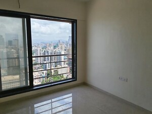 Room in 2 BHK Apartment at Kosmos Express Tower CHS, Borivali West – for Rent