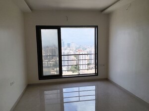 Room in 2 BHK Apartment at Kosmos Express Tower CHS, Borivali West – for Rent