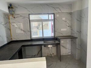 Kitchen in 2 BHK Apartment at Kosmos Express Tower CHS, Borivali West – for Rent