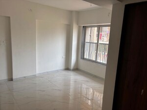 Room in 2 BHK Apartment at Kosmos Express Tower CHS, Borivali West – for Rent