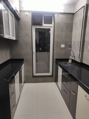 Kitchen in 2 BHK Apartment at Vasant Fiona, Pokhran Road No Two – for Rent