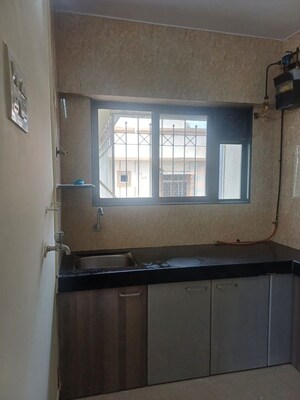 Kitchen in 2.5 BHK Apartment at Ajmera Pristine, Borivali West – for Rent
