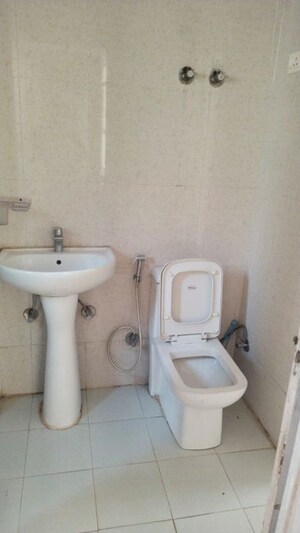 Bathroom in 2 BHK Apartment at Panchsheel Greens, Sector 16 Greater Noida – for Rent