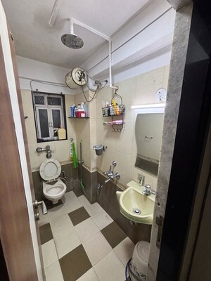 Bathroom in 1 BHK Apartment at Seven Star CHS, Borivali West – for Rent