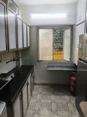 Kitchen in 1 BHK Apartment at Durgashram CHS, Andheri East – for Rent