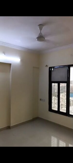 Room in 1 BHK Apartment at Dheeraj Solitaire, Malad West – for Rent