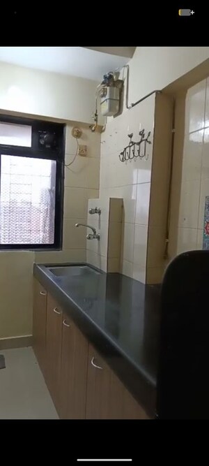 Kitchen in 1 BHK Apartment at Dheeraj Solitaire, Malad West – for Rent