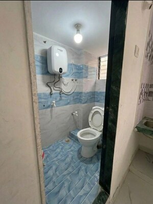 Bathroom in 1 BHK Apartment at Navgharkul CHS, Sector 48a Nerul – for Rent