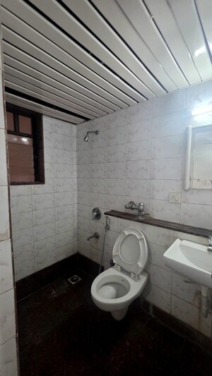 Bathroom in 2 BHK Apartment at Triveni Vasant Vihar CHS, Vasant Vihar – for Sale