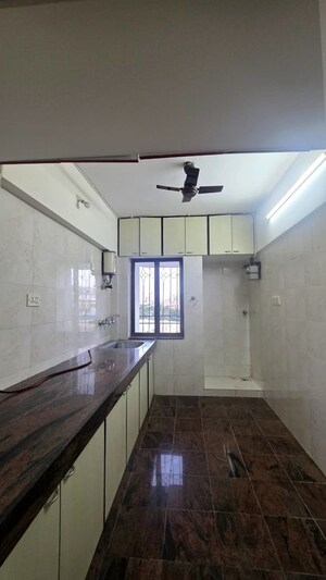 Kitchen in 2 BHK Apartment at Triveni Vasant Vihar CHS, Vasant Vihar – for Sale