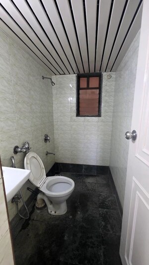 Bathroom in 2 BHK Apartment at Triveni Vasant Vihar CHS, Vasant Vihar – for Sale