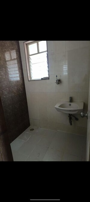 Bathroom in 3 BHK Apartment at Manav Silver Skyscapes, Wakad – for Rent