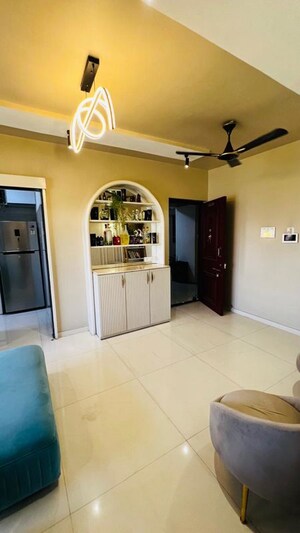 Living Room in 2 BHK Apartment at Bini Winspace Amelio, Andheri West – for Rent
