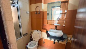 Bathroom in 2 BHK Apartment at Mahagun Mywoods, Sector 16c Greater Noida – for Rent