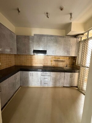 Kitchen in 2.5 BHK Apartment at Mahagun Mywoods, Sector 16c Greater Noida – for Rent