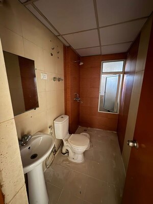 Bathroom in 2.5 BHK Apartment at Mahagun Mywoods, Sector 16c Greater Noida – for Rent