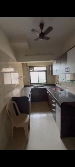 Kitchen in 2 BHK Apartment at Puranik City, Kasarvadavali – for Rent