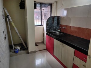 Kitchen in Studio Apartment at Ambe Prerna Apartment, Ghansoli – for Rent