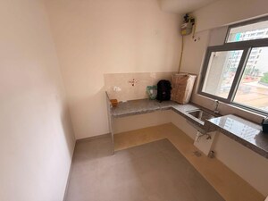 Kitchen in 2 BHK Apartment at Piramal Vaikunth, Balkum Pada – for Rent