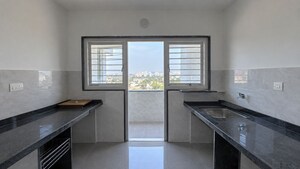 Kitchen in 2 BHK Apartment at Suvan Shades, Mundhwa – for Rent