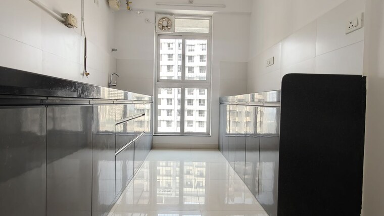 Kitchen, godrej-emerald 2 Bedroom 708 Sq.Ft. Apartment In Ghodbunder Road Thane 10664630