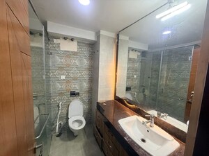 Bathroom in 3.5 BHK Apartment at Puri Pranayam, Sector 82 – for Rent