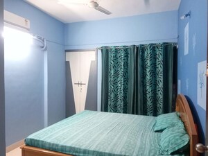 Bedroom in 2 BHK Apartment at Kumar Periwinkle, Kharadi – for Rent