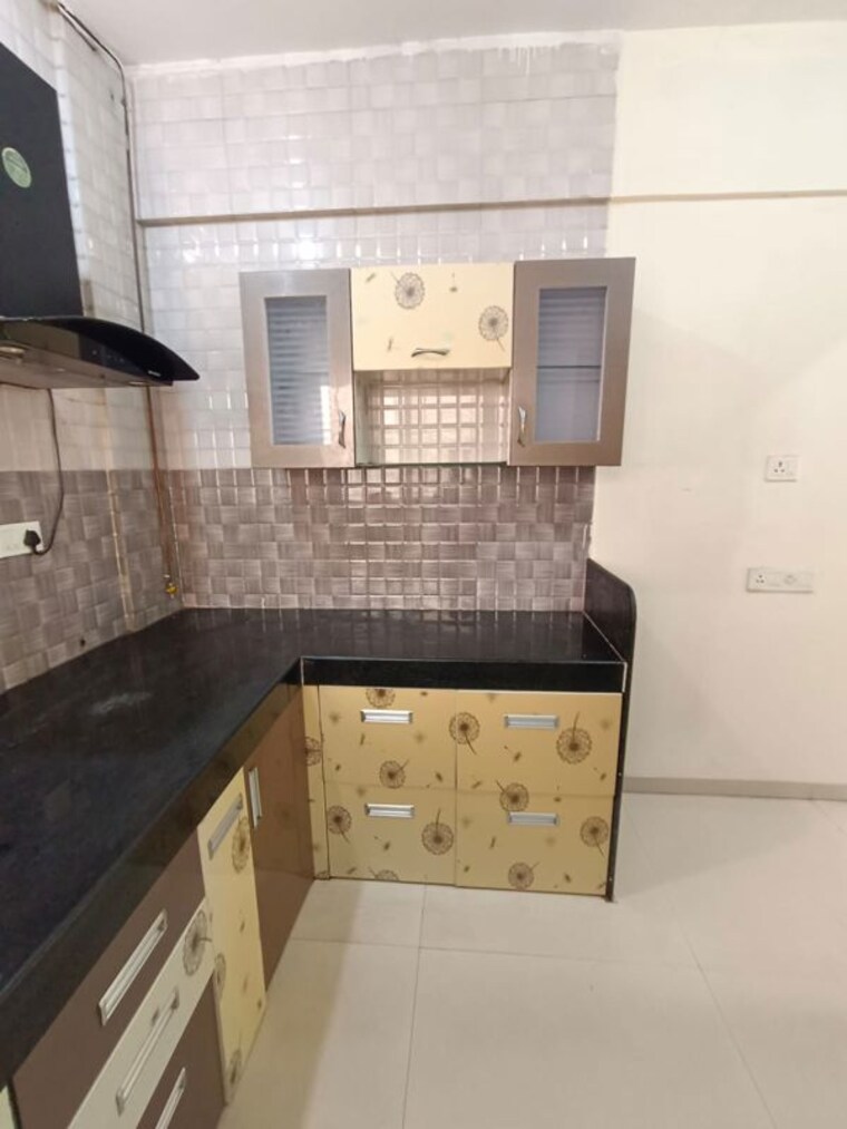 Kitchen, essen-aishwaryam-comfort-phase-i 2 Bedroom 790 Sq.Ft. Apartment In Akurdi Pune 10664806