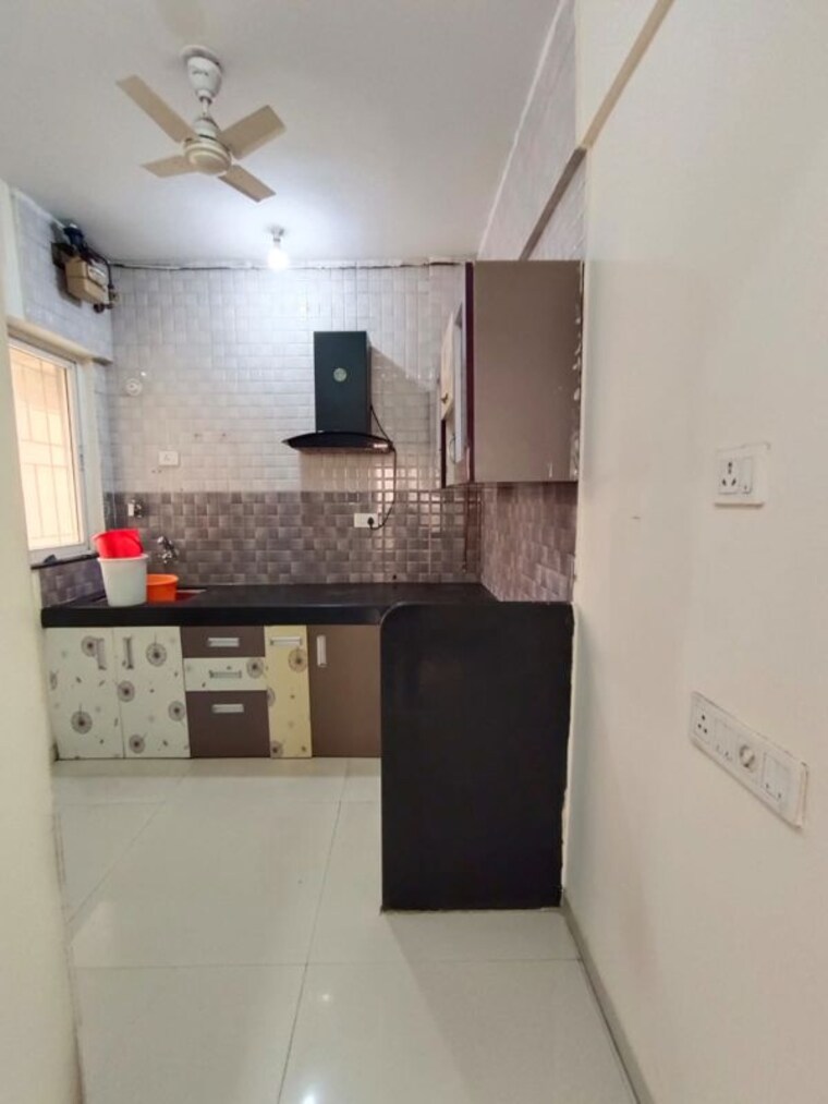 Kitchen, essen-aishwaryam-comfort-phase-i 2 Bedroom 790 Sq.Ft. Apartment In Akurdi Pune 10664806