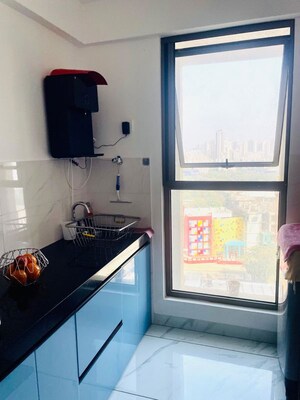 Kitchen in 2 BHK Apartment at Lodha Crown Quality Homes, Majiwada – for Rent