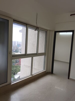 Room in 2 BHK Apartment at Omkar Signet, Malad East – for Rent