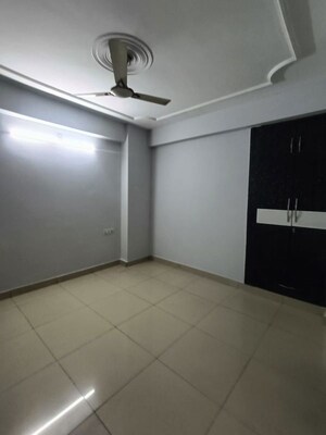 Room in 2 BHK Apartment at Charms Castle, Raj Nagar Extension – for Rent