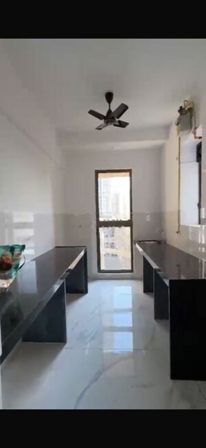 Kitchen in 2 BHK Apartment at Raymond Ten X Habitat, Pokhran Road No Two – for Rent