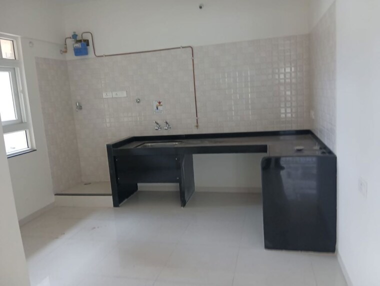 Kitchen, nyati-elysia 2 Bedroom 1100 Sq.Ft. Apartment In Kharadi Pune 10664916