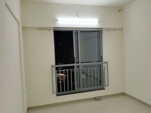 Room in 2 BHK Apartment at Mahindra Happinest Tathawade Phase 1, Tathawade – for Rent
