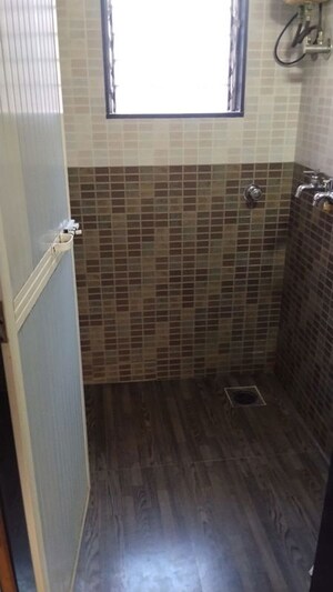 Bathroom in 1 BHK Apartment at Sun & Breeze Apartment, Vile Parle East – for Rent