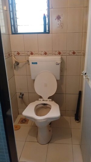 Bathroom in 1 BHK Apartment at Sun & Breeze Apartment, Vile Parle East – for Rent