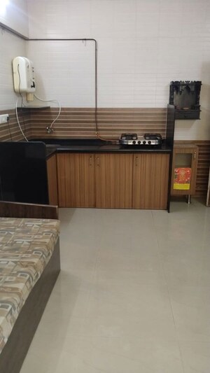 Kitchen in 1 BHK Apartment at Sun & Breeze Apartment, Vile Parle East – for Rent