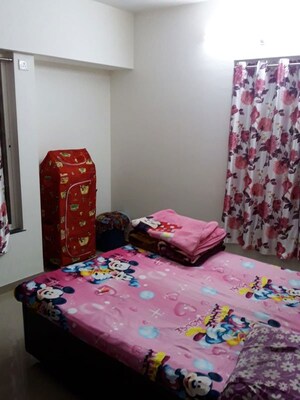 Bedroom in 2 BHK Apartment at Unnati Gagan Cefiro, Undri – for Rent