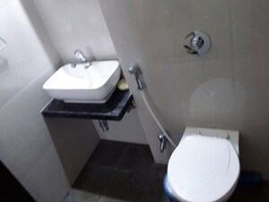 Bathroom in 2 BHK Apartment at Unnati Gagan Cefiro, Undri – for Rent