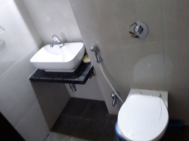 Bathroom, unnati-gagan-cefiro 2 Bedroom 689 Sq.Ft. Apartment In Undri Pune 10665145