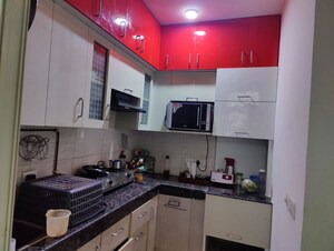 Kitchen in 2 BHK Apartment at Shri Radha Aqua Garden, Sector 16b Greater Noida – for Rent