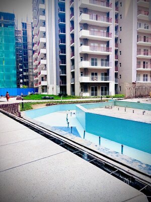 Swimming Pool in 2 BHK Apartment at Shri Radha Aqua Garden, Sector 16b Greater Noida – for Rent