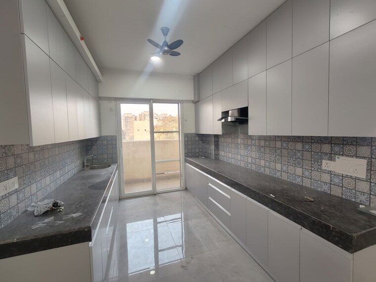 Kitchen, tulip-yellow 3 Bedroom 1704 Sq.Ft. Apartment In Sector 69 Gurgaon 10665162
