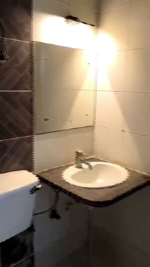Bathroom in 2 BHK Apartment at Supertech Livingston, Sain Vihar – for Sale