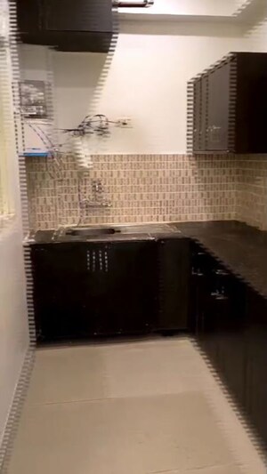 Kitchen in 2 BHK Apartment at Supertech Livingston, Sain Vihar – for Sale