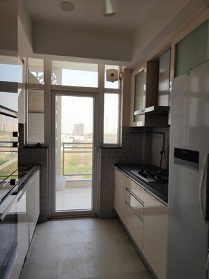 Kitchen in 4 BHK Apartment at Sare Crescent Parc, Sector 92 – for Sale
