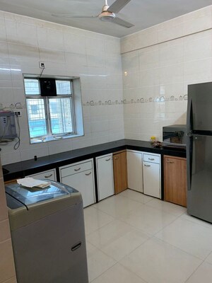 Kitchen in 2 BHK Apartment at New Shankar Premises CHS, Dadar West – for Rent