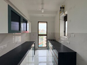 Kitchen in 2 BHK Apartment at Raymond Aashiyana, Vartak Nagar – for Rent