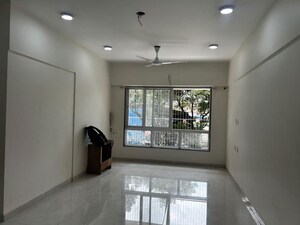 Living Room in 2 BHK Apartment at Vaastu Omkar, Vile Parle East – for Rent